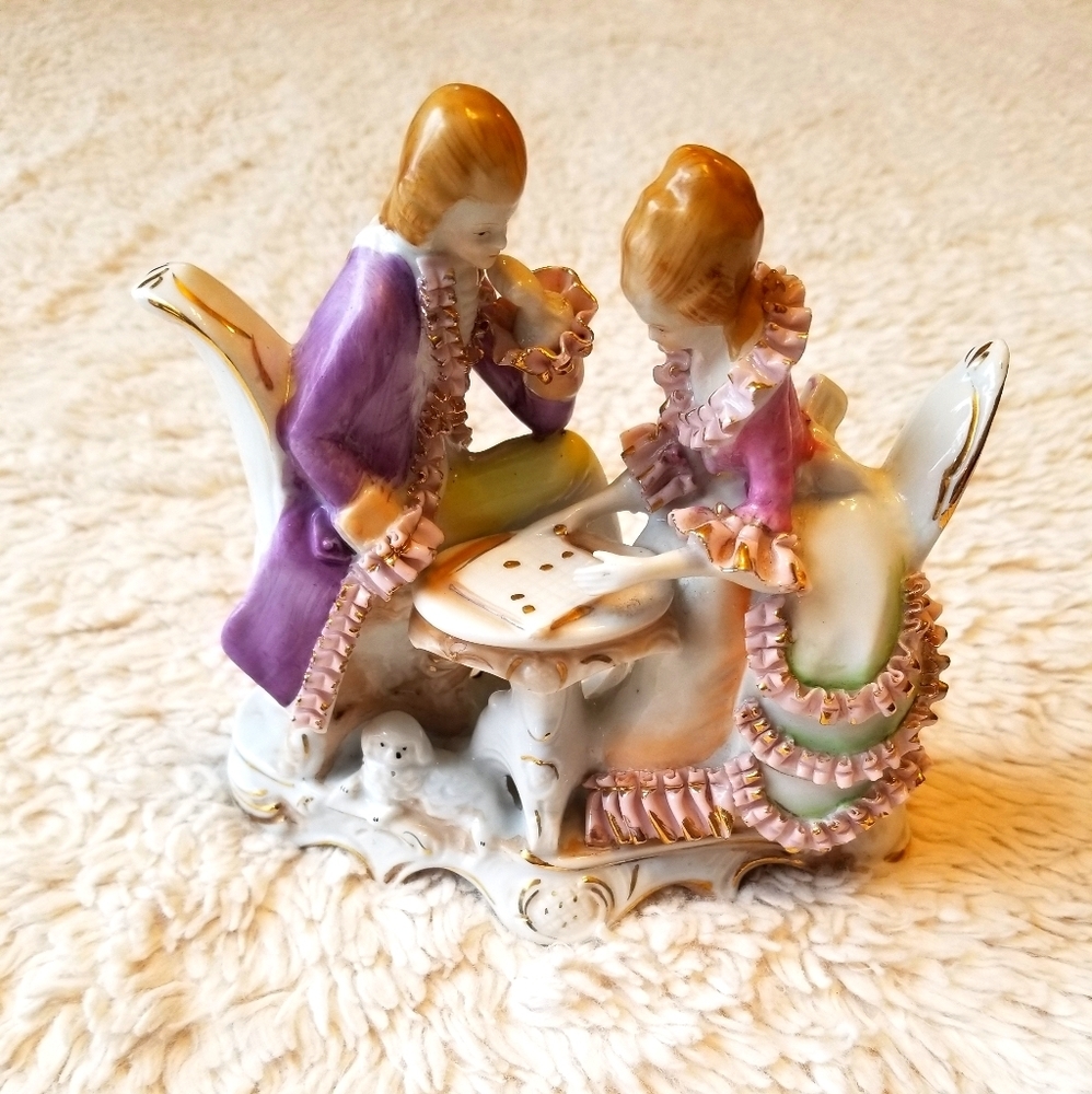 Bone China Lace Couple playing Dams Figurine